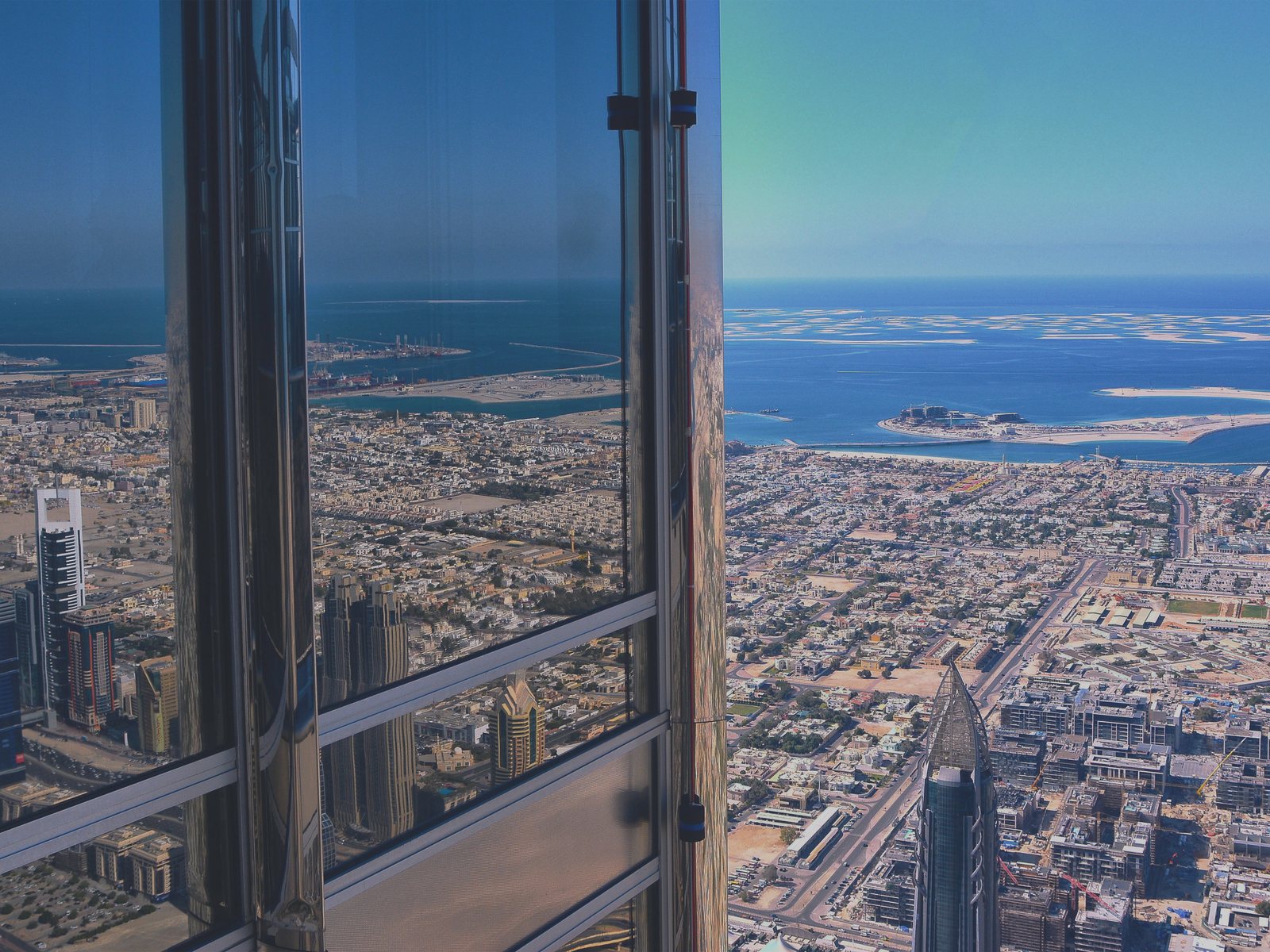 The city seen from high inside a glass tower